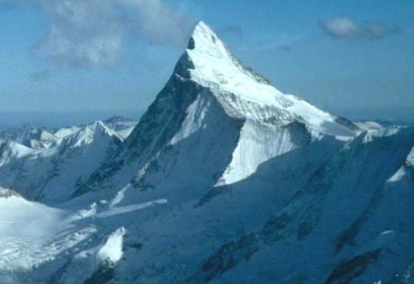 Finsteraarhorn ( 4274m ) in the Bernese Oberland of the Swiss Alps