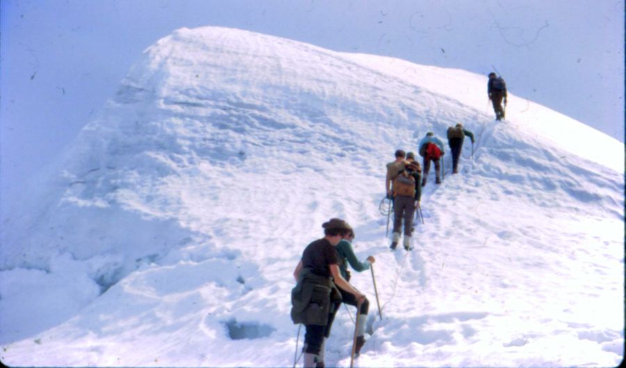 Ascending summit cone of Balmhorn in the Bernese Oberlands of Switzerland