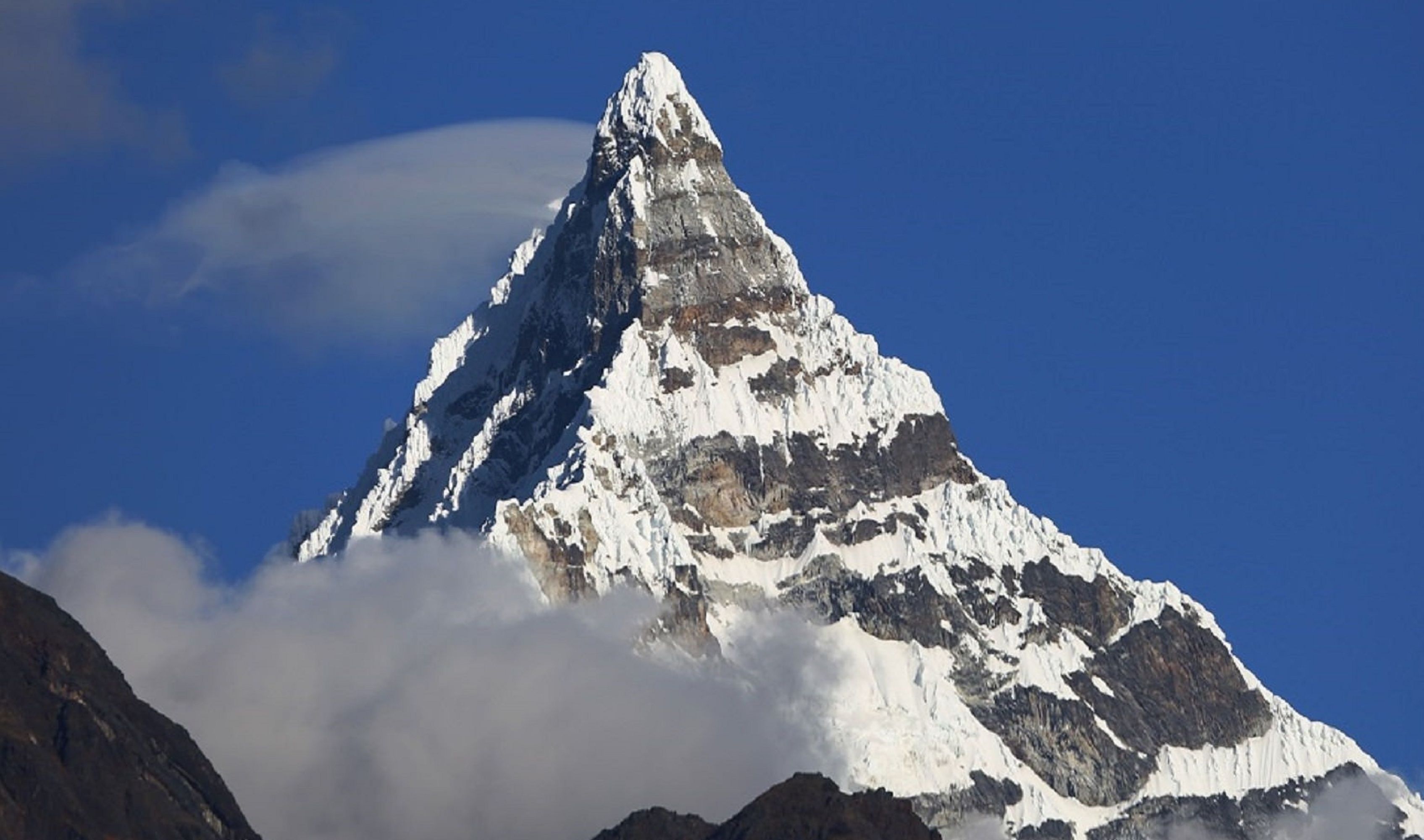 Taulliraju 6035 metres in the Cordillera Blanca of the Peru Andes