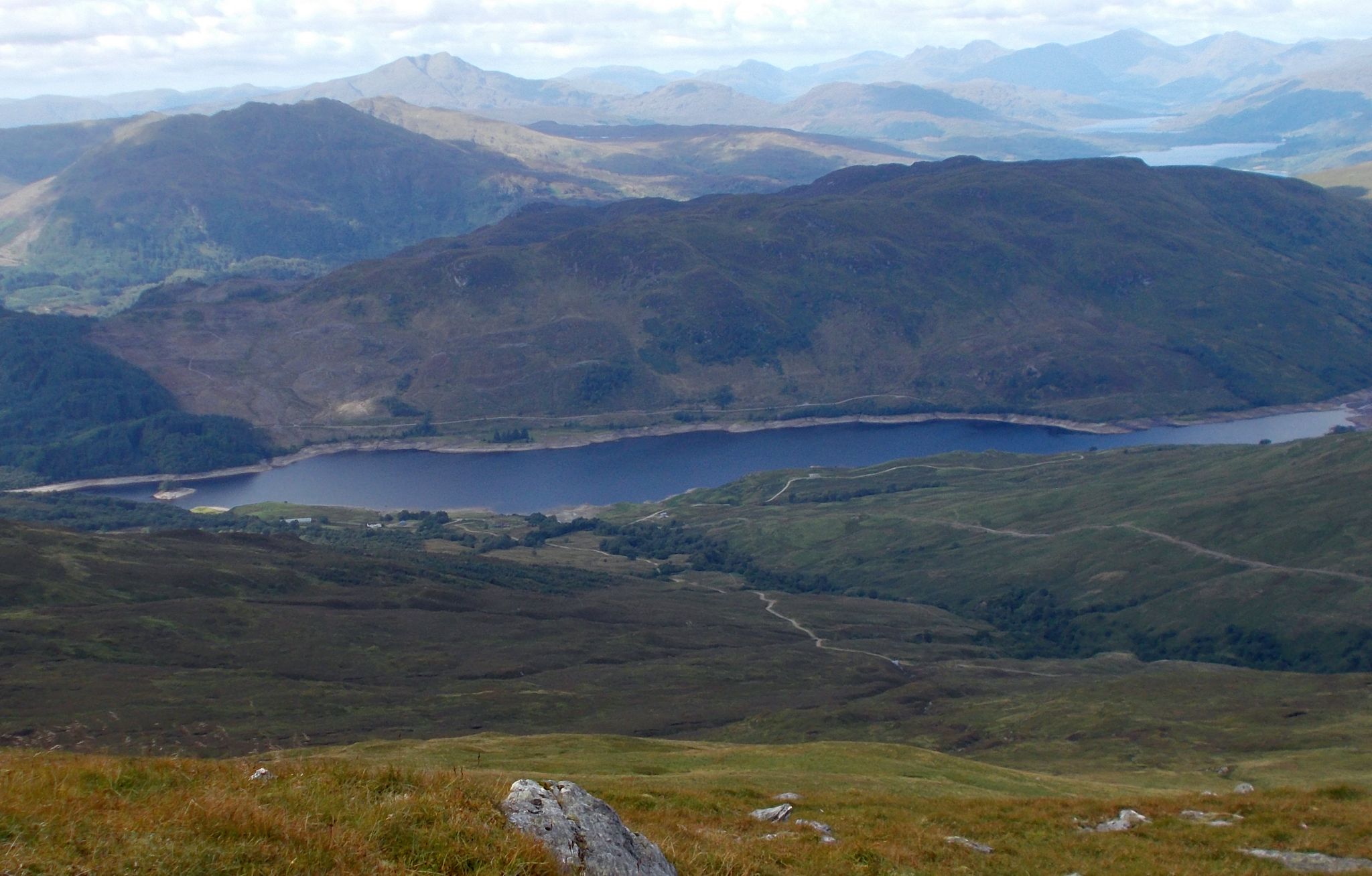 Ben Lomond and Arrochar Alps beyond Glen Kinglas Reservoir from Ben Ledi