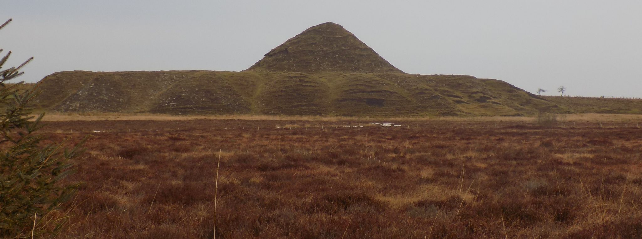 Old bing on road north around loch