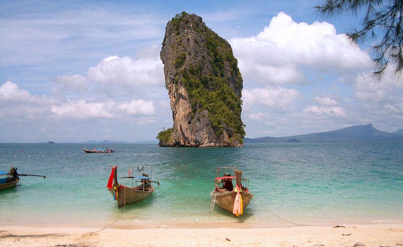 Beach and Limestone Rock Islet at Hat Tham Phra Nang near Krabi in Southern Thailand