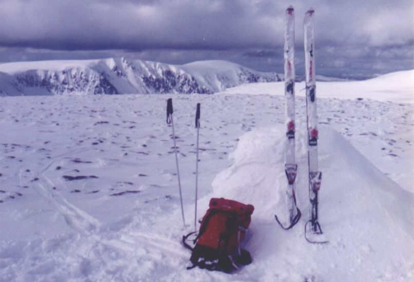 Snowbound summit cairn on the Cairngorm plateau